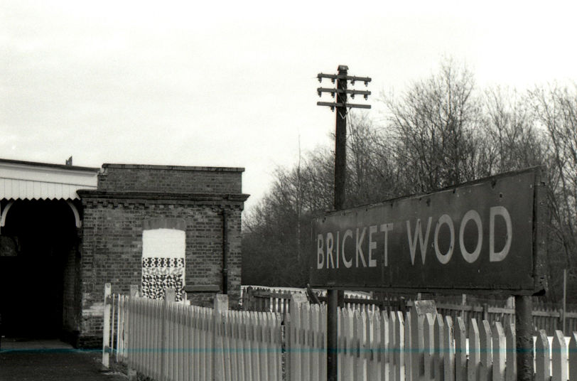 The station building, looking rather forlorn. The murals in the bricked-up doors and windows suggest that this picture was taken post-1977, when they were painted by the Bricket Wood Art Club to commemorate the Silver Jubilee.